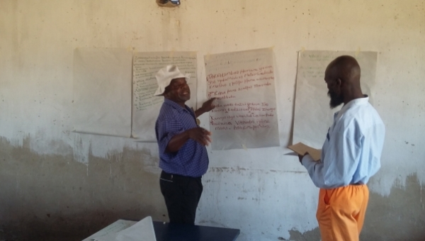Village herd presenting their input to the peacebuilding strategy